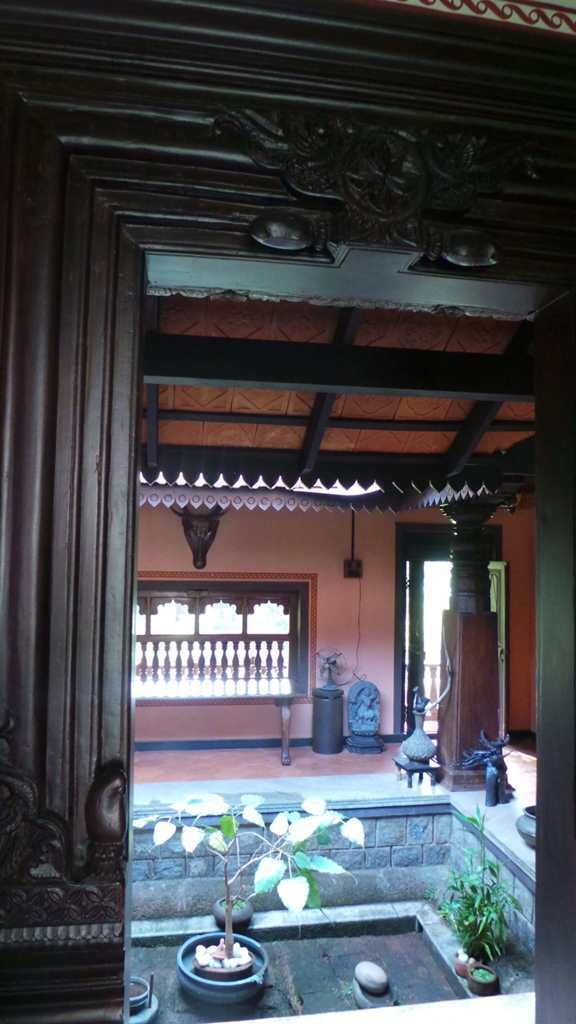 Mangalore tiles and rafters with open courtyard